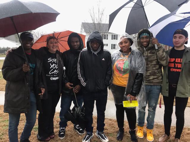 Protesters Rally Against Violence in Community